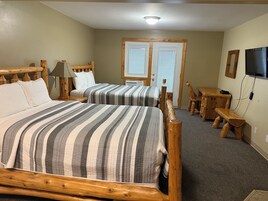 Superior Suite, 2 Queen Beds, Kitchenette | Desk, iron/ironing board, free WiFi, bed sheets