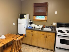 Superior Suite, 2 Queen Beds, Kitchenette | Private kitchen | Fridge, microwave, coffee/tea maker