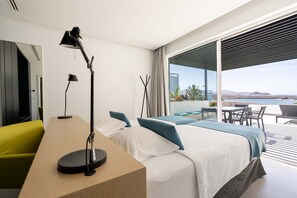 Suíte exclusiva, 2 quartos, 2 banheiros | Roupas de cama premium, cofres nos quartos, cortinas blackout