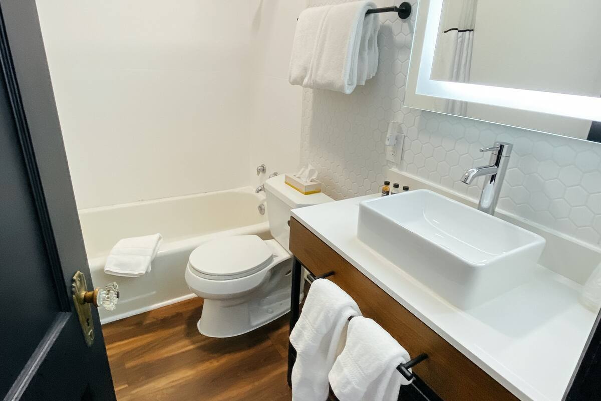 room, private bathroom (room 214) | bathroom | combined shower/bathtub, free toiletries, hair dryer, towels