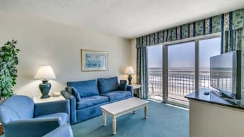 Condo, 3 Bedrooms, Oceanfront | Living area | 32-inch flat-screen TV with cable channels, TV, DVD player