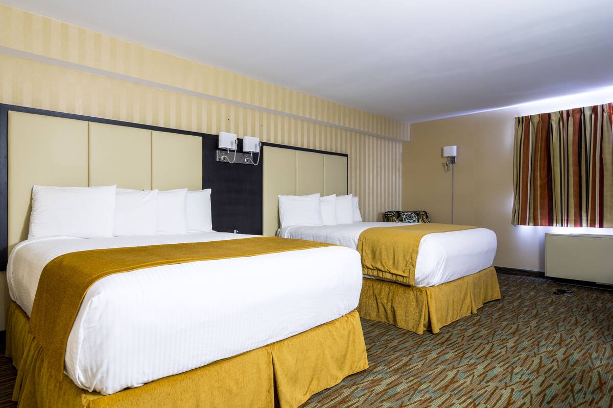 Queen Room with Two Queen Beds | Desk, iron/ironing board, WiFi (free), bed sheets