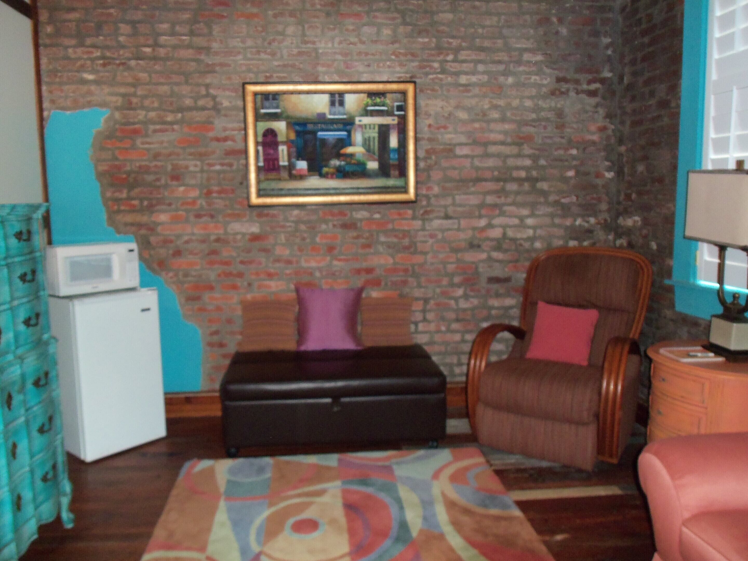 basic double or twin room | living area | flat-screen tv