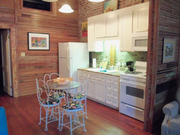 Basic Suite, 1 King Bed with Sofa bed | Living area | Flat-screen TV - The Main Street Hotel (Yazoo City)