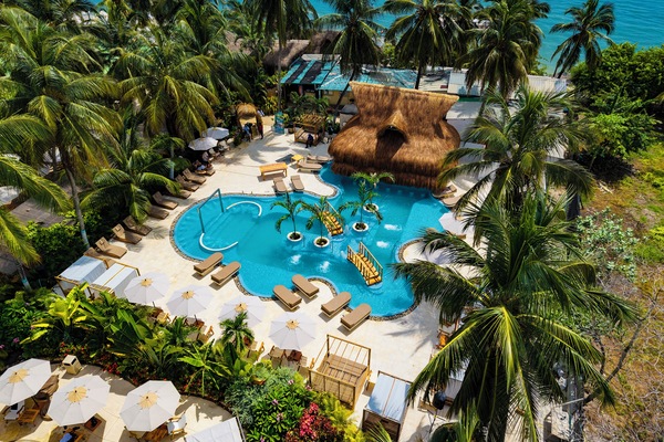 Outdoor pool, open 9:00 AM to 6:00 PM, pool umbrellas