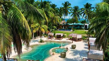 Outdoor pool, open 9:00 AM to 6:00 PM, pool umbrellas