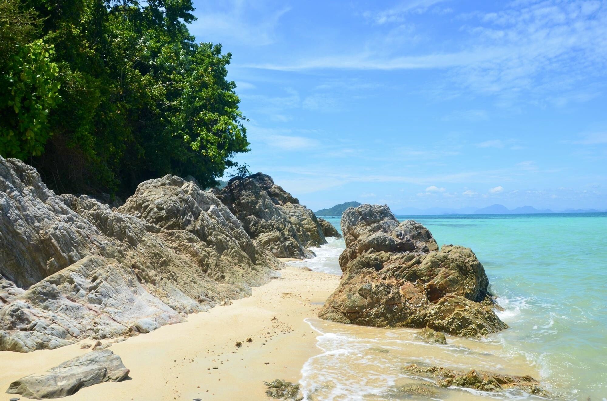on the beach, sun-loungers, beach umbrellas, beach towels