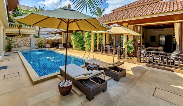 Outdoor pool, pool umbrellas, pool loungers