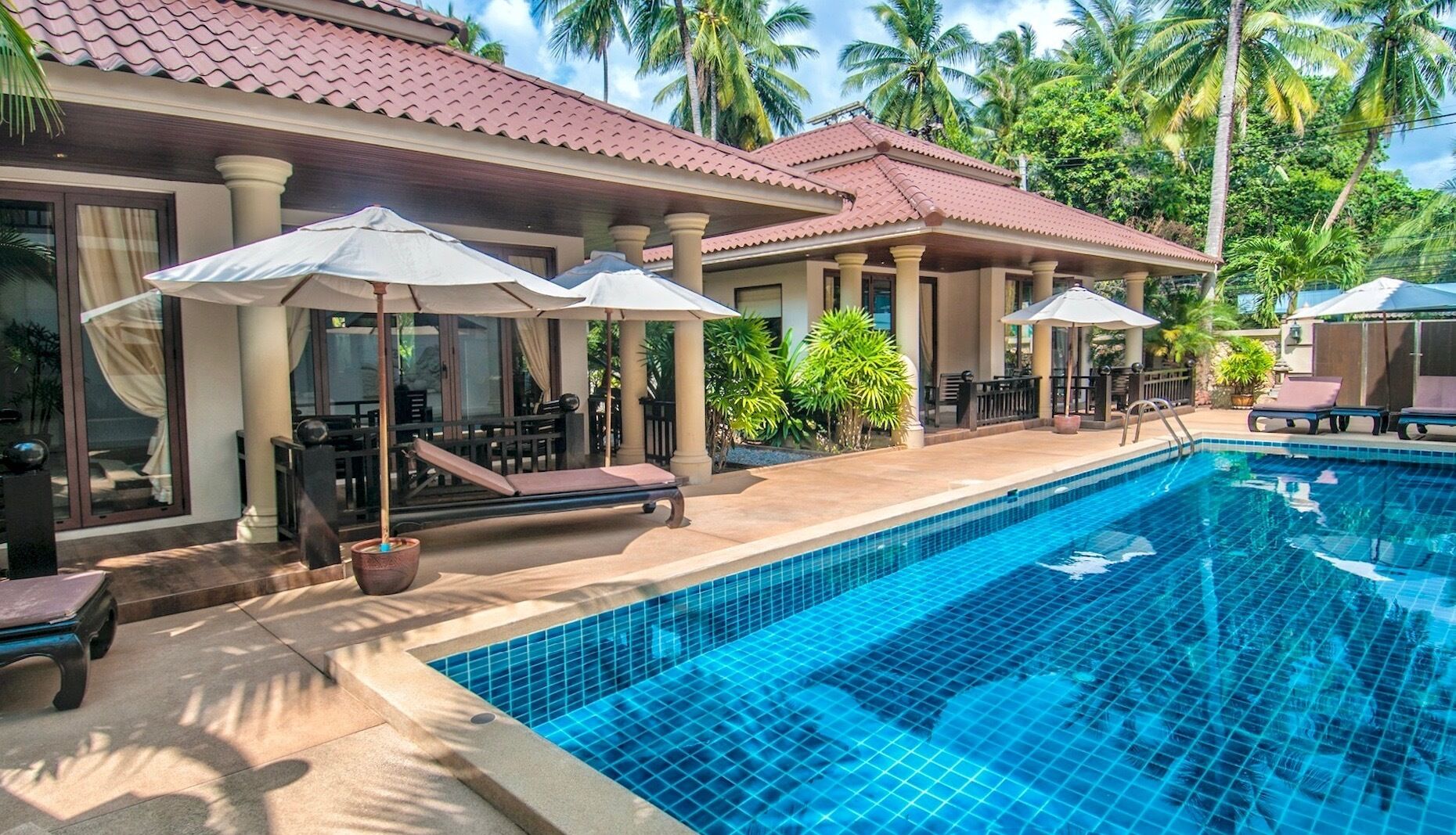outdoor pool, pool umbrellas, pool loungers