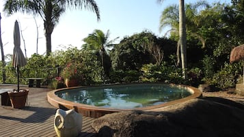 Outdoor pool, a heated pool, sun loungers