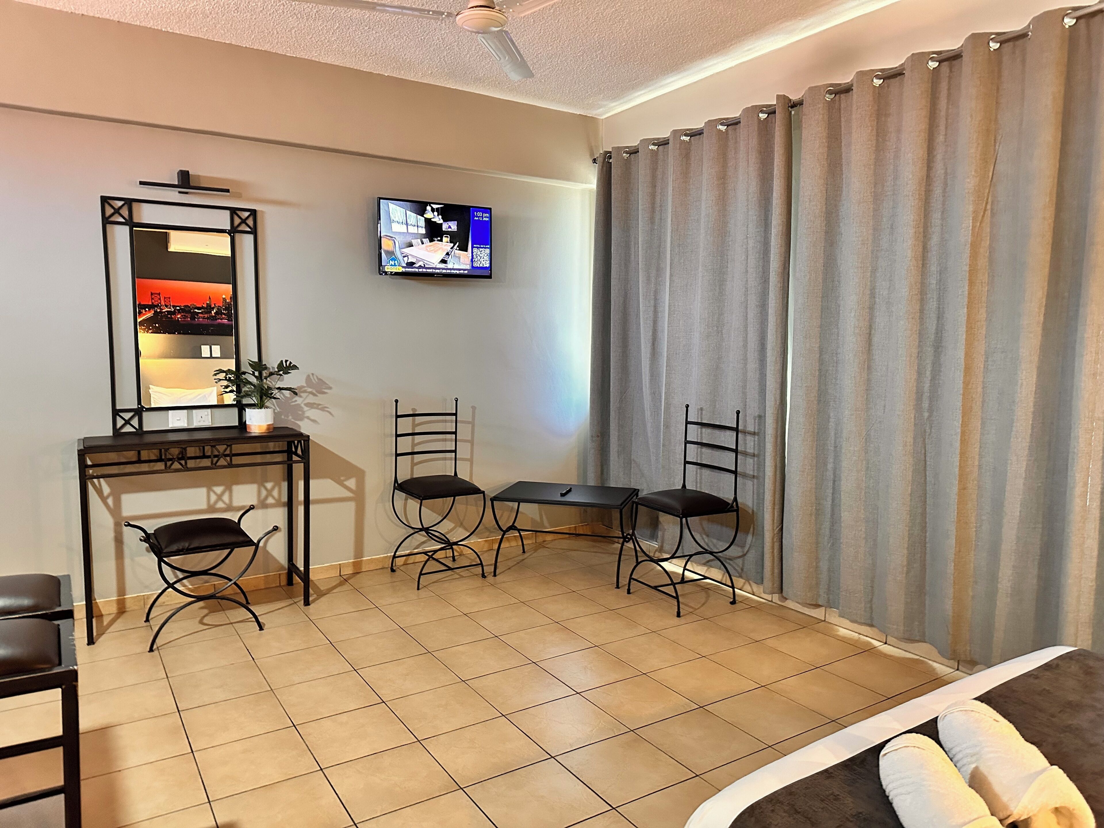 Deluxe Room | 1 bedroom, blackout drapes, free WiFi, bed sheets