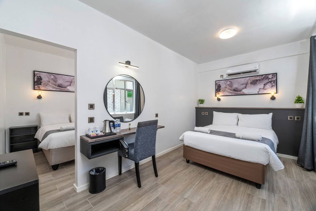 Habitación familiar | Caja fuerte, wifi gratis, ropa de cama