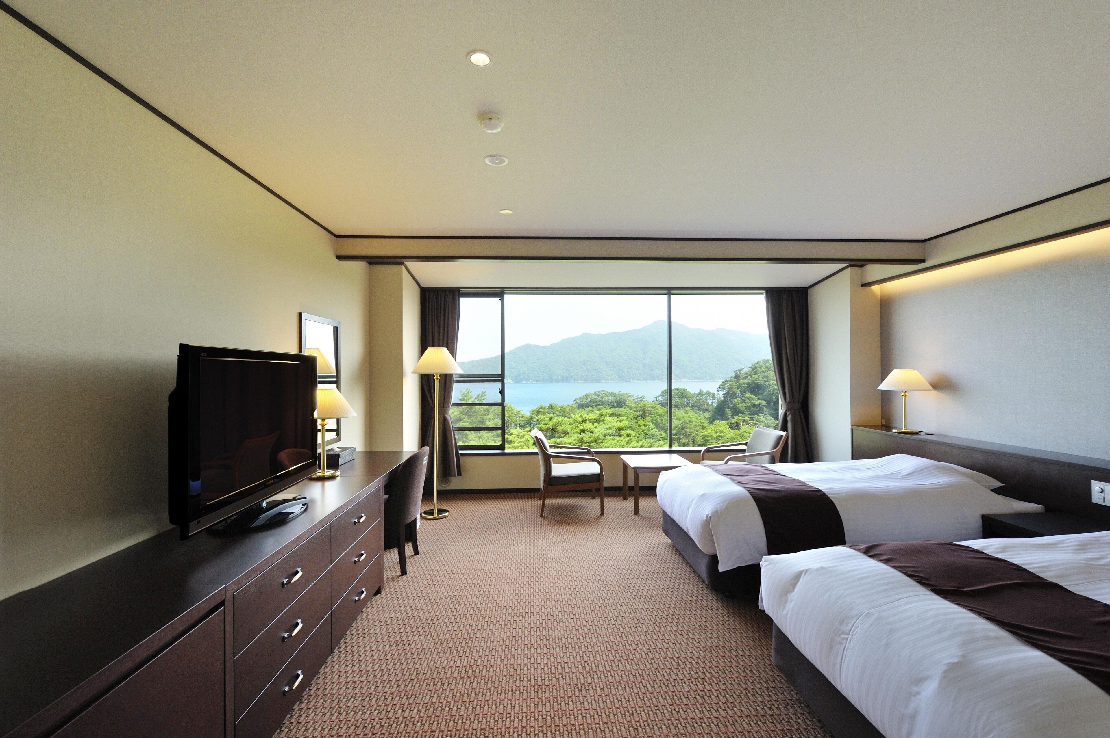 western style twin bedroom, ocean view [online exclusive] | premium bedding, in-room safe, blackout curtains, free wifi
