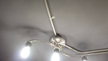 A ceiling with three light fixtures.