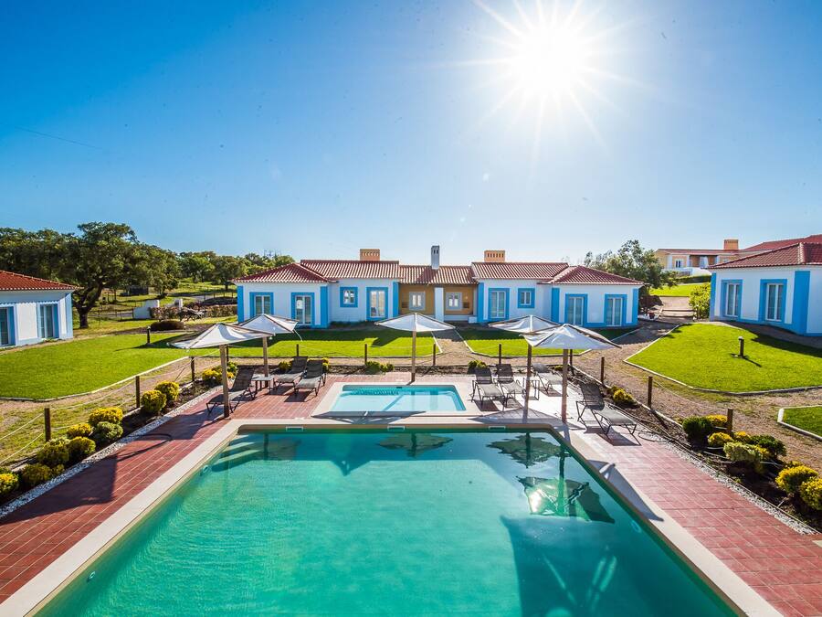 Indoor pool, outdoor pool, pool umbrellas, sun loungers