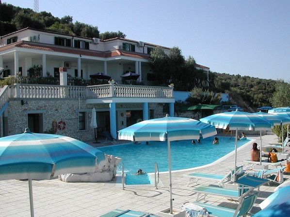 2 outdoor pools, pool umbrellas, pool loungers