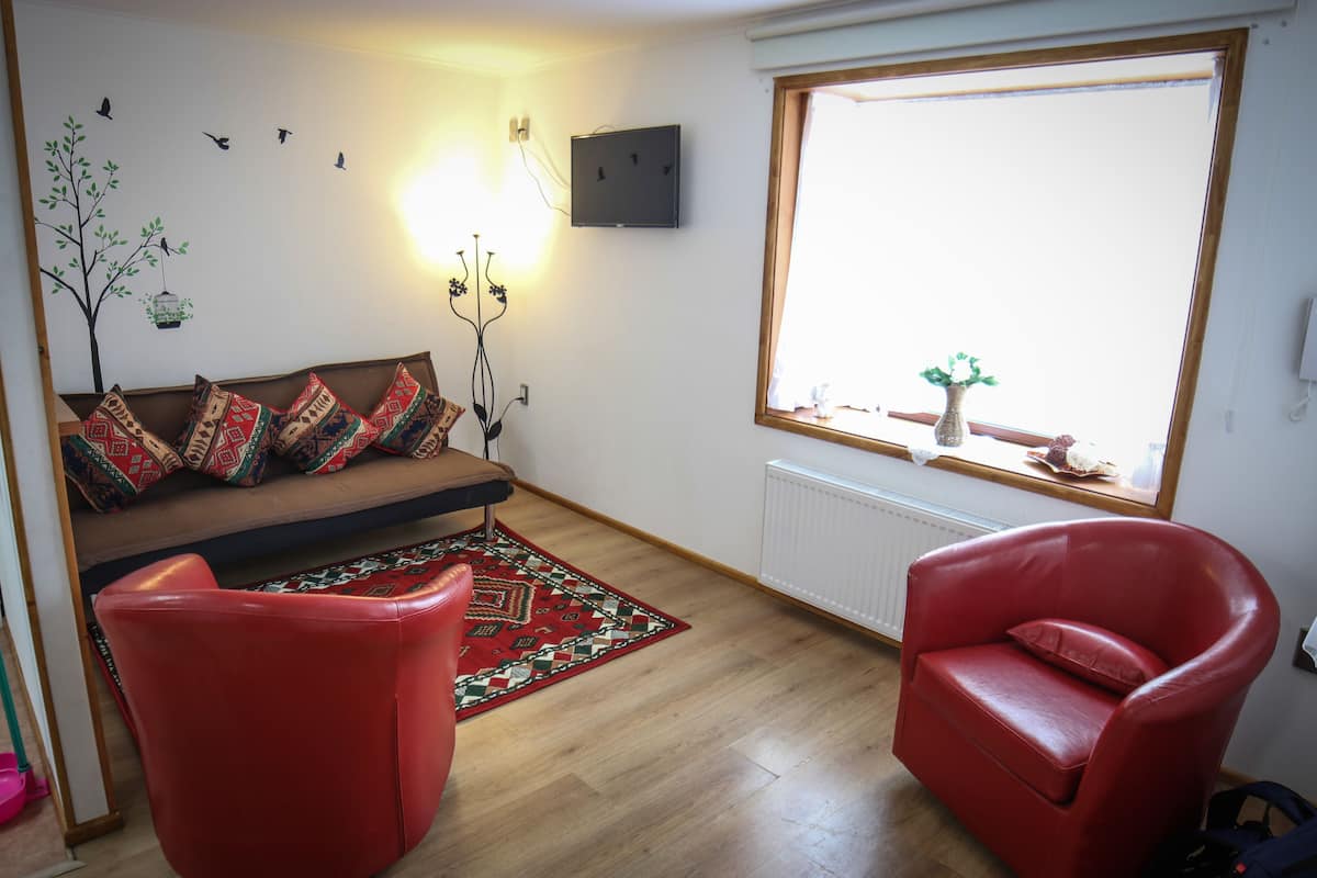 Apartment, 2 Bedrooms, Kitchen, Ground Floor | Living area | 32-inch LCD TV with cable channels, TV