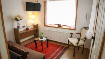 Apartment, 1 Bedroom, Kitchen, Ground Floor | Living area | 32-inch LCD TV with cable channels, TV