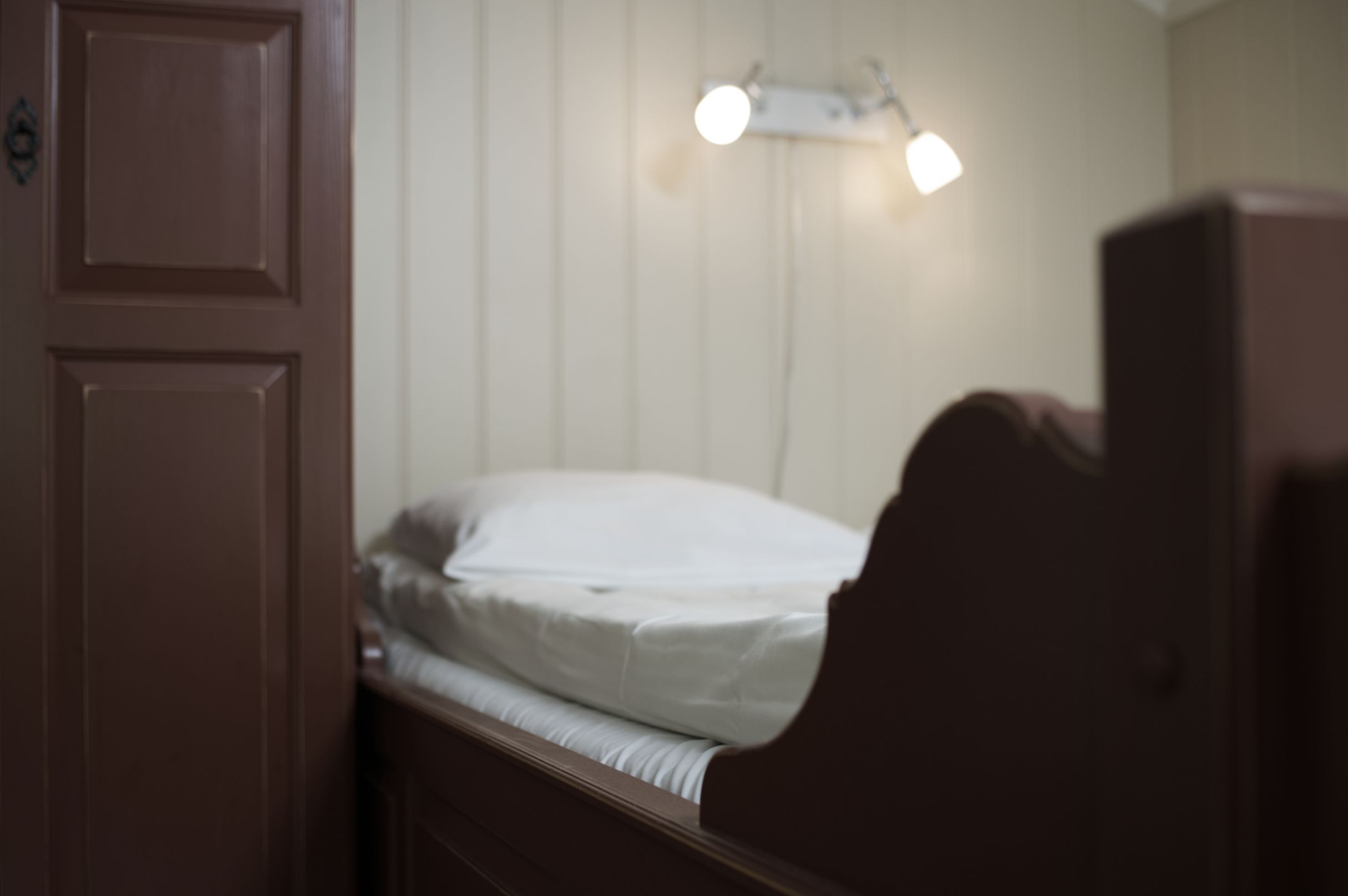 family room | pillow-top beds, desk, soundproofing, cots/infant beds