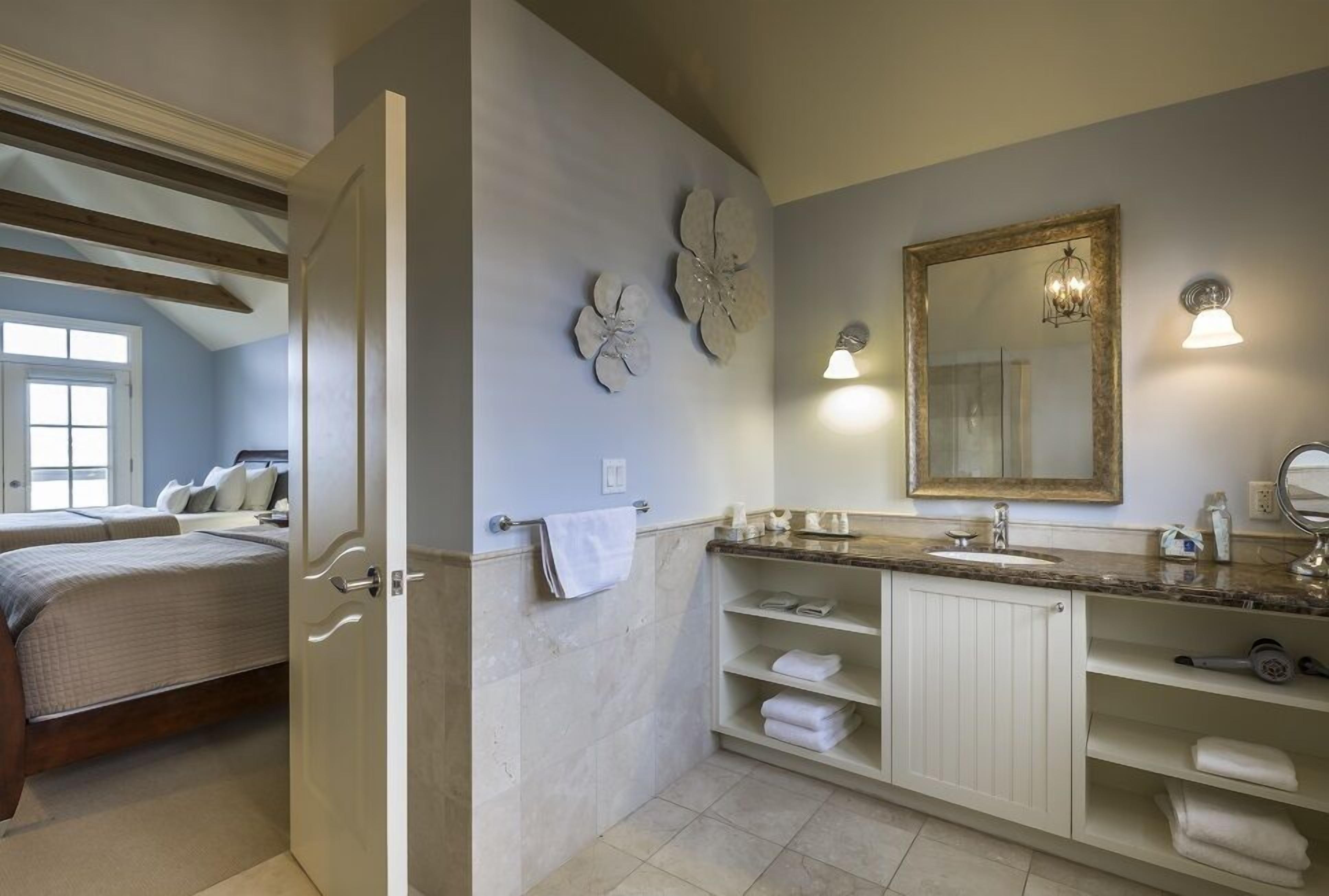 luxury loft, multiple beds, lake view | bathroom | shower, rainfall showerhead, designer toiletries, hair dryer