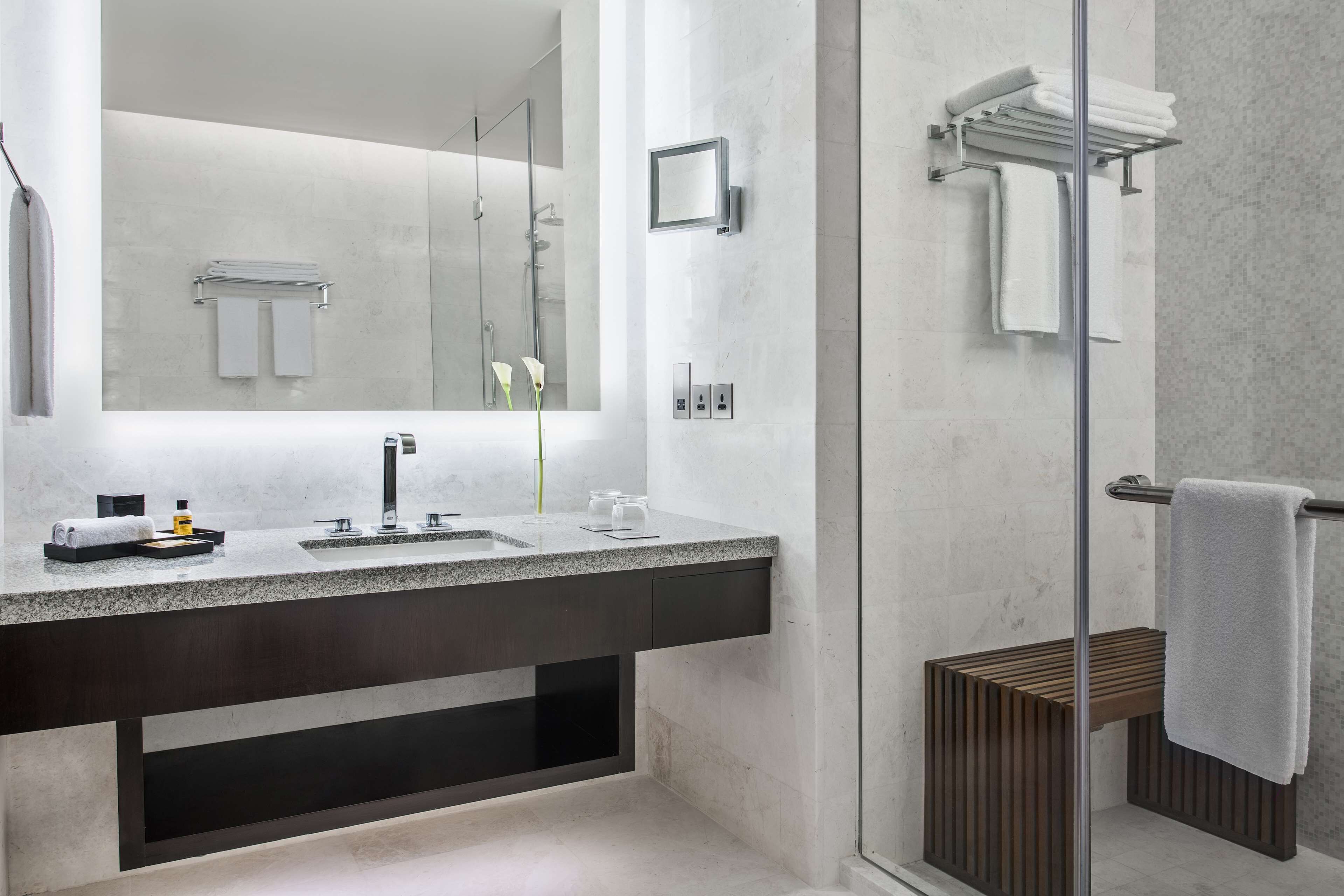 separate bathtub and shower, hair dryer, bathrobes, slippers