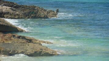 On the beach, white sand, beach towels