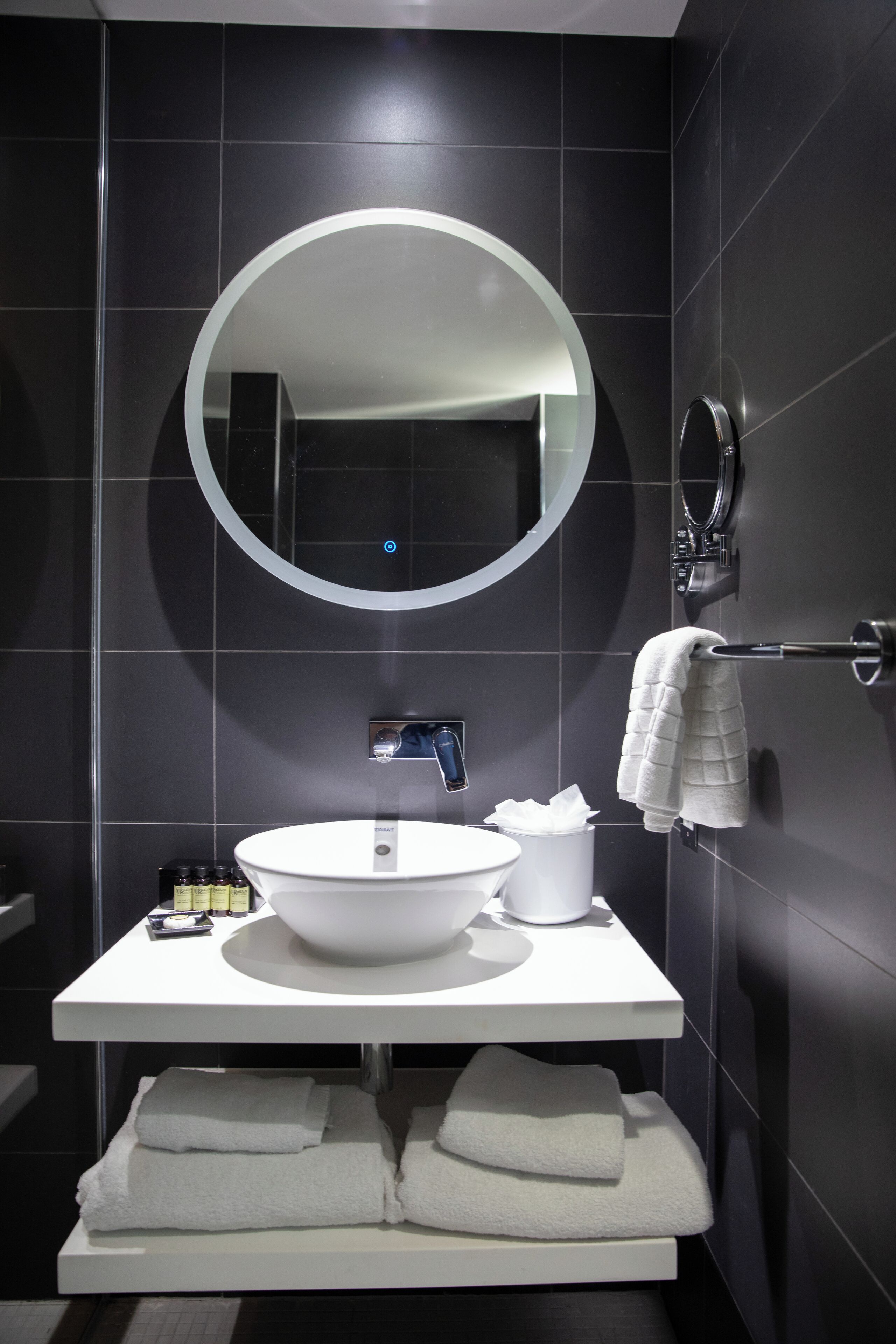 deluxe room, 1 king bed | bathroom | shower, rainfall showerhead, designer toiletries, hair dryer