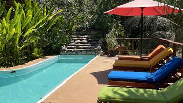 Outdoor pool, pool umbrellas, sun loungers