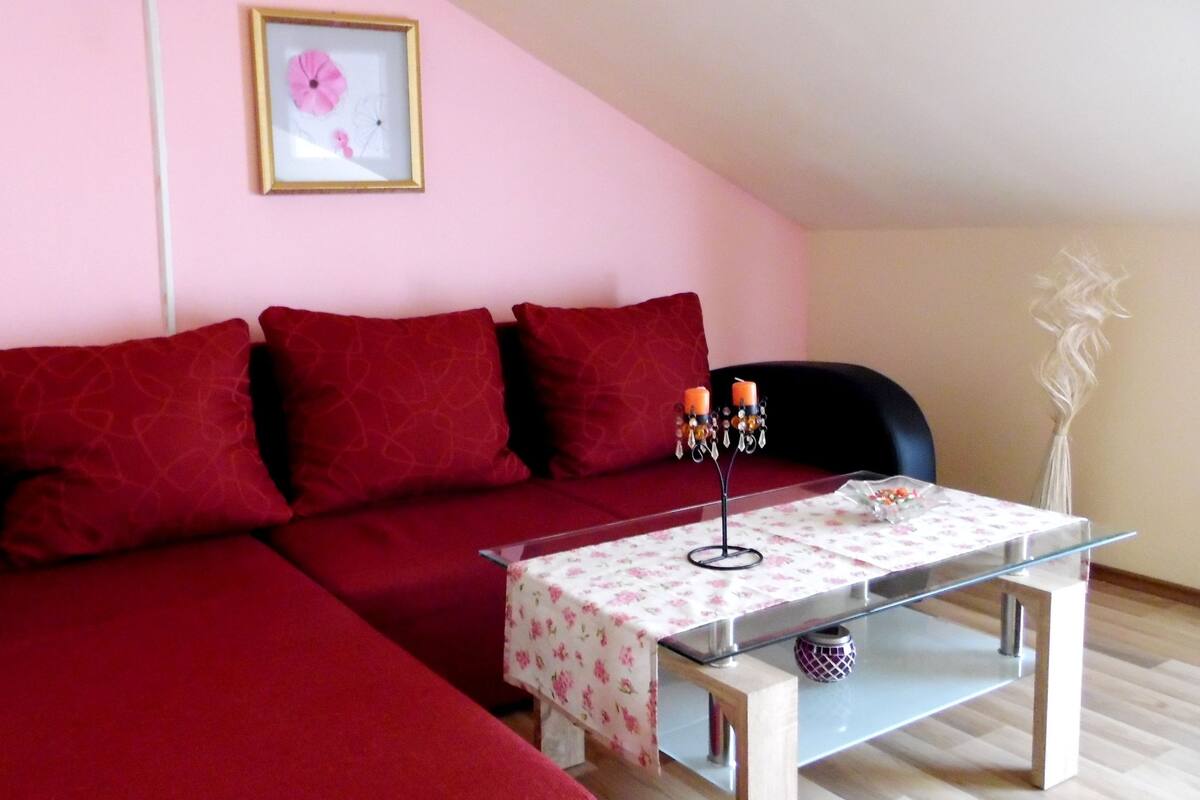 Panoramic-Apartment, Balkon, Meerblick | Wohnbereich
