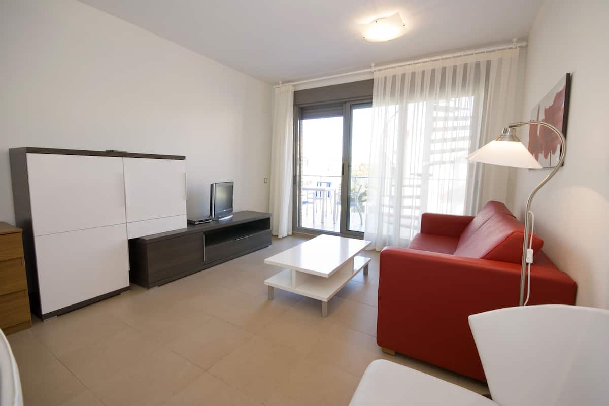 Appartement, 1 slaapkamer, terras | Woonruimte | Een televisie