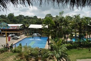 Seasonal outdoor pool, pool umbrellas, pool loungers