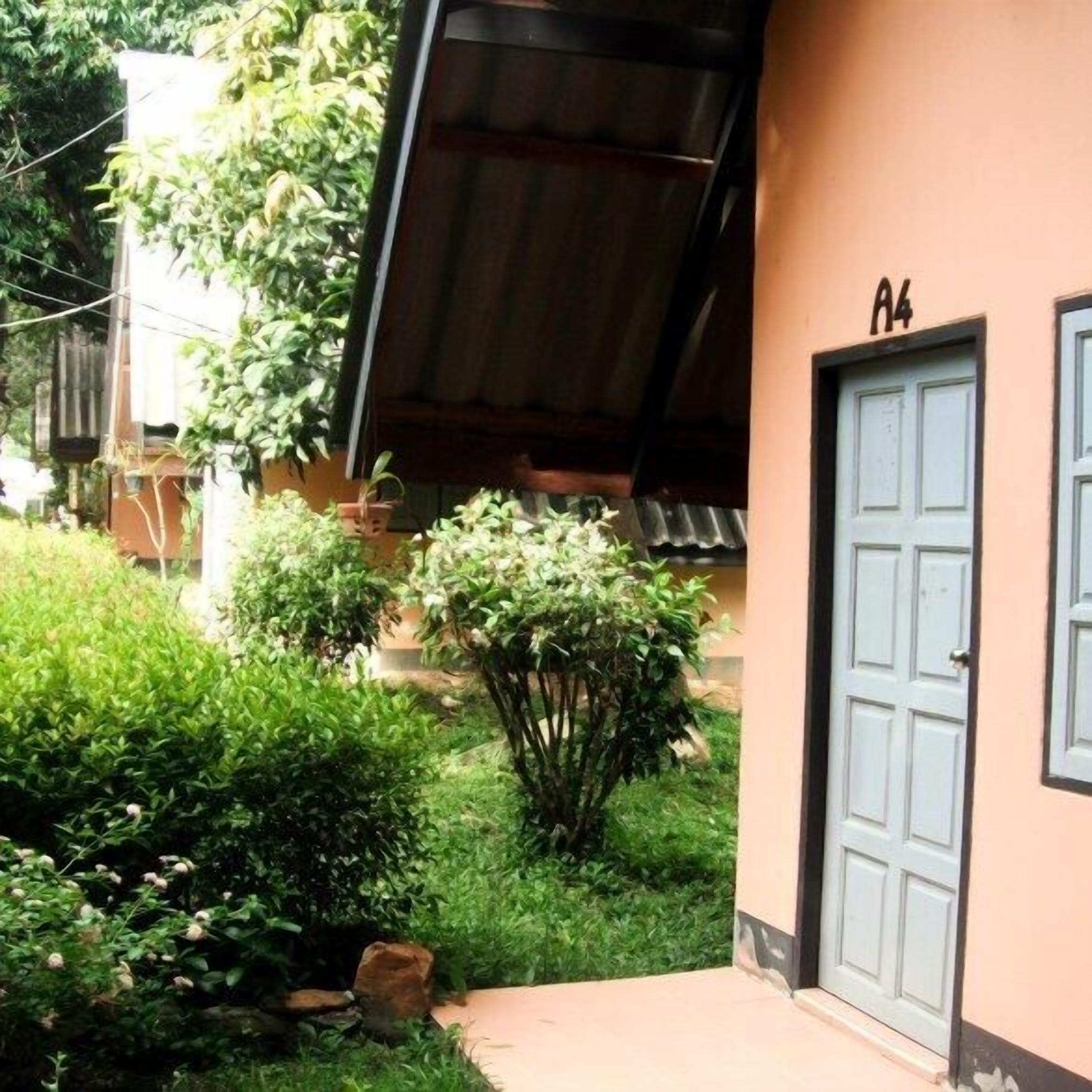 A house with a door labeled "A4" and a covered porch area.