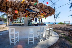 Cocktail bar, beach views, open daily