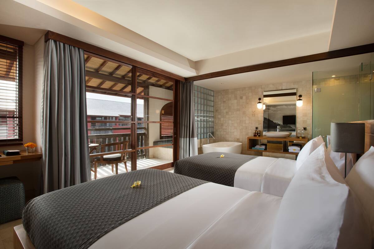 Premium bedding, in-room safe, desk, iron/ironing board (on request)