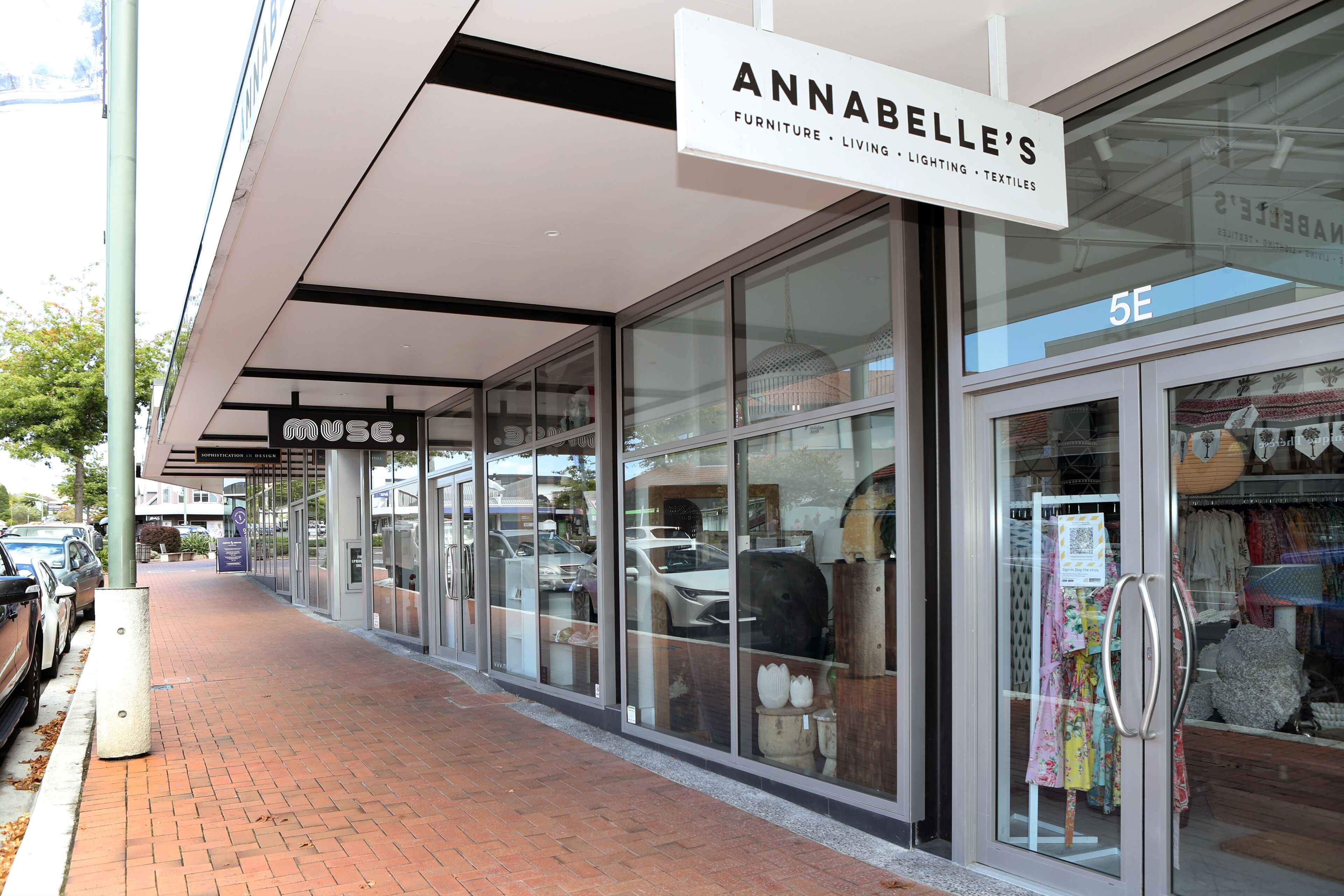 A storefront with a sign for 'ANNABELLE'S' offering furniture, living, lighting, and textiles.
