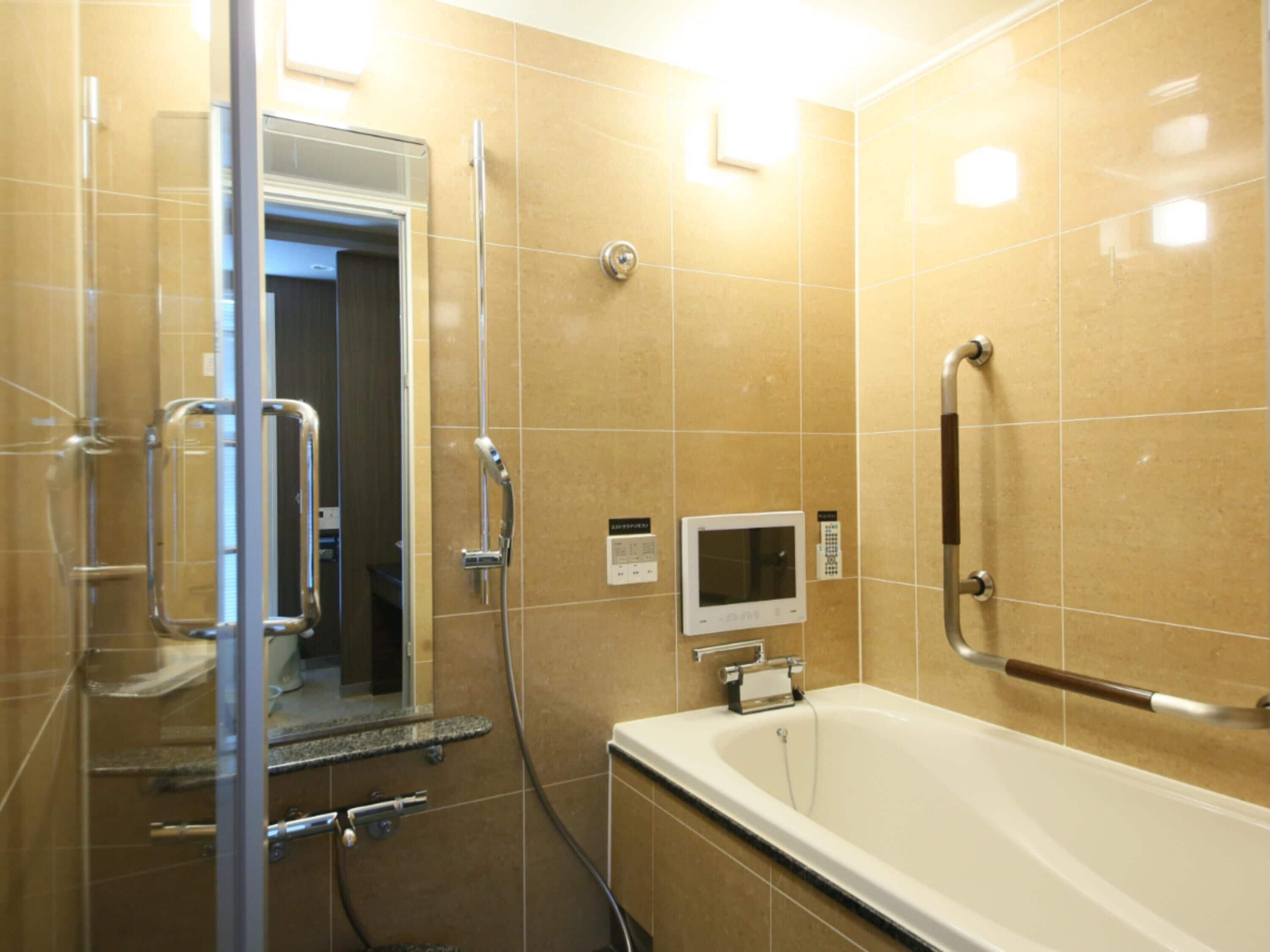 twin room, multiple beds, bathtub grab bars, non smoking | bathroom | combined shower/bathtub, free toiletries, hair dryer, slippers