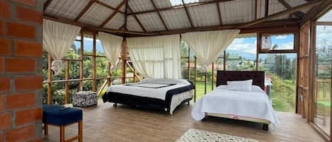 Deluxe Quadruple Room, Hill View | Premium bedding, down comforters, iron/ironing board (on request)