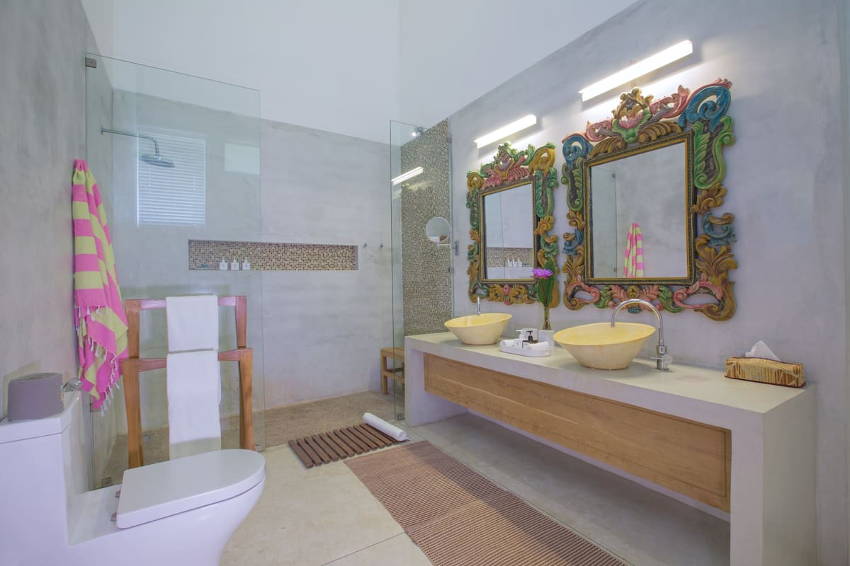 ocean signature suite | bathroom | shower, rainfall showerhead, free toiletries, hair dryer