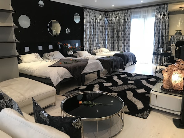 Premium bedding, in-room safe, individually decorated