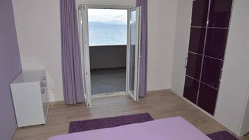 Superior Apartment, 2 Bedrooms, Balcony, Sea View | Desk, soundproofing, cots/infant beds, rollaway beds