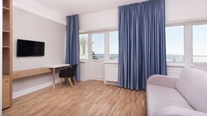 Quarto casal superior | Escrivaninha, berços (sobretaxa), camas extras/dobráveis (sobretaxa)