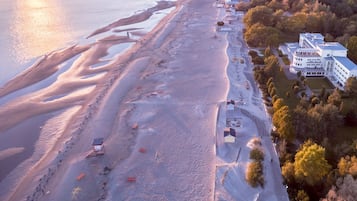 On the beach, white sand