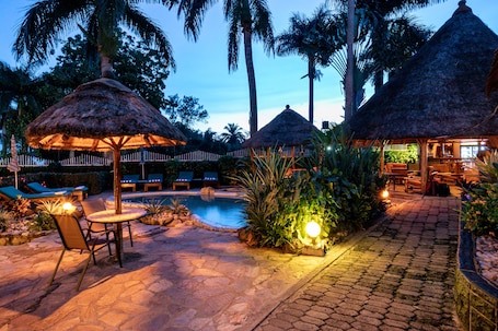 Outdoor pool, pool umbrellas, sun loungers
