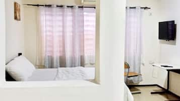 Chambre Deluxe, 1 grand lit | 1 chambre, literie de qualité supérieure, couette en duvet d'oie