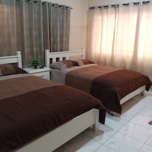 Premium bedding, down comforters, pillowtop beds, iron/ironing board