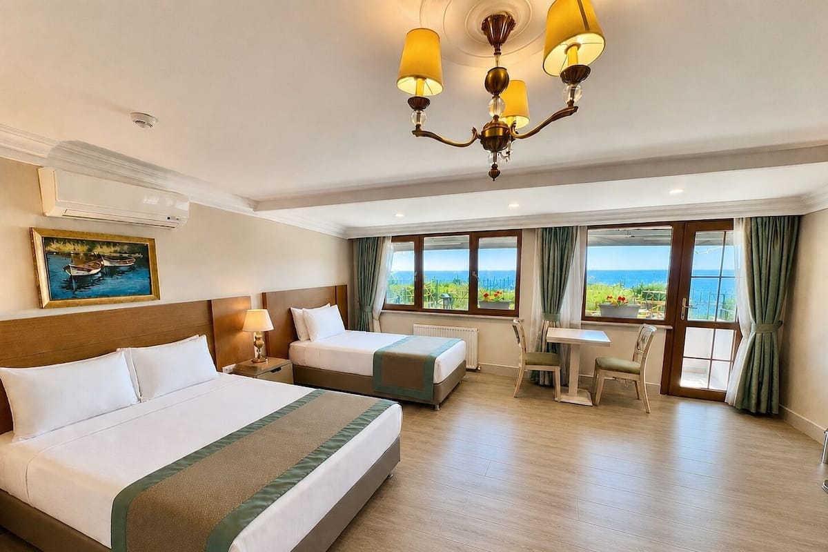 Family Suite, Sea View or City View | Ropa de cama de alta calidad, camas Select Comfort y minibar
