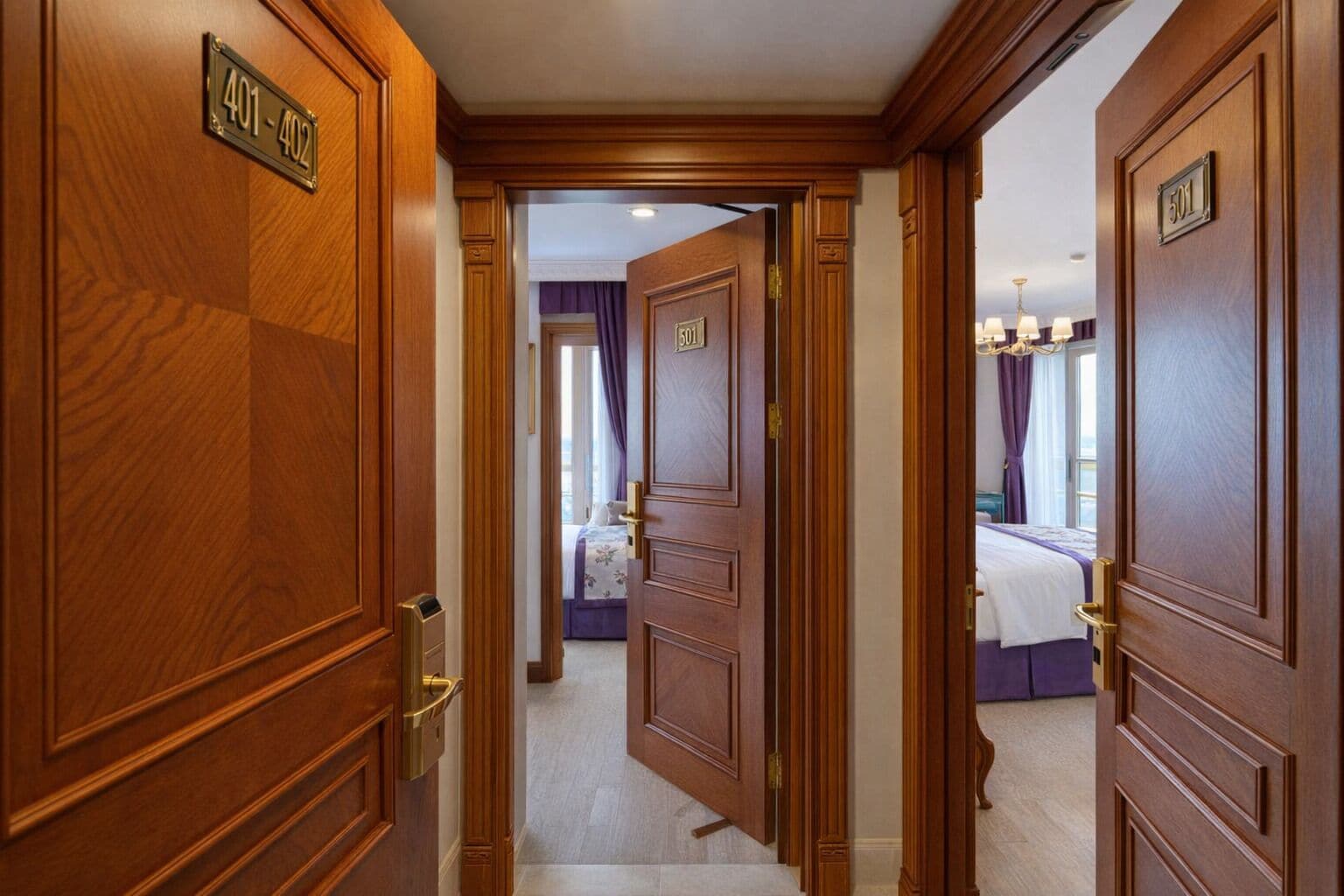 A hotel room with wooden doors, a bed, a nightstand, and a window with curtains.