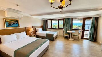Family Suite, Sea View or City View | ๊ณ ๊ธ ์นจ๊ตฌ, ์
๋ ํธ ์ปดํฌํธ ์นจ๋, ๋ฏธ๋๋ฐ, ๊ฐ์ค ๋ด ๊ธ๊ณ