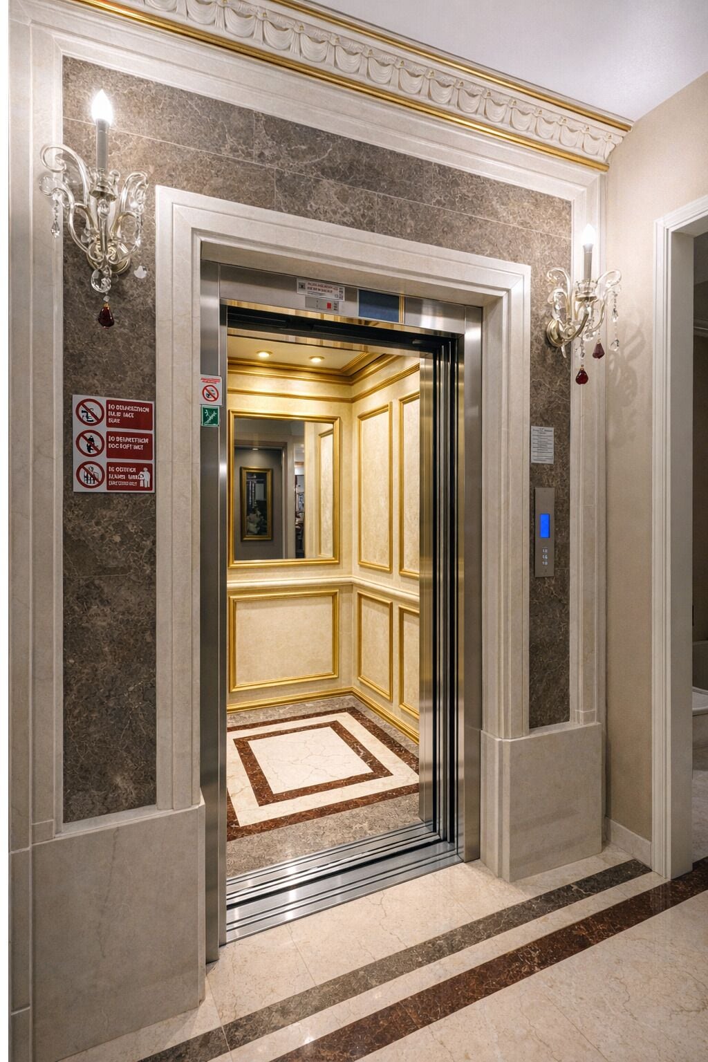 An elevator with marble walls, gold trim, and a patterned floor.