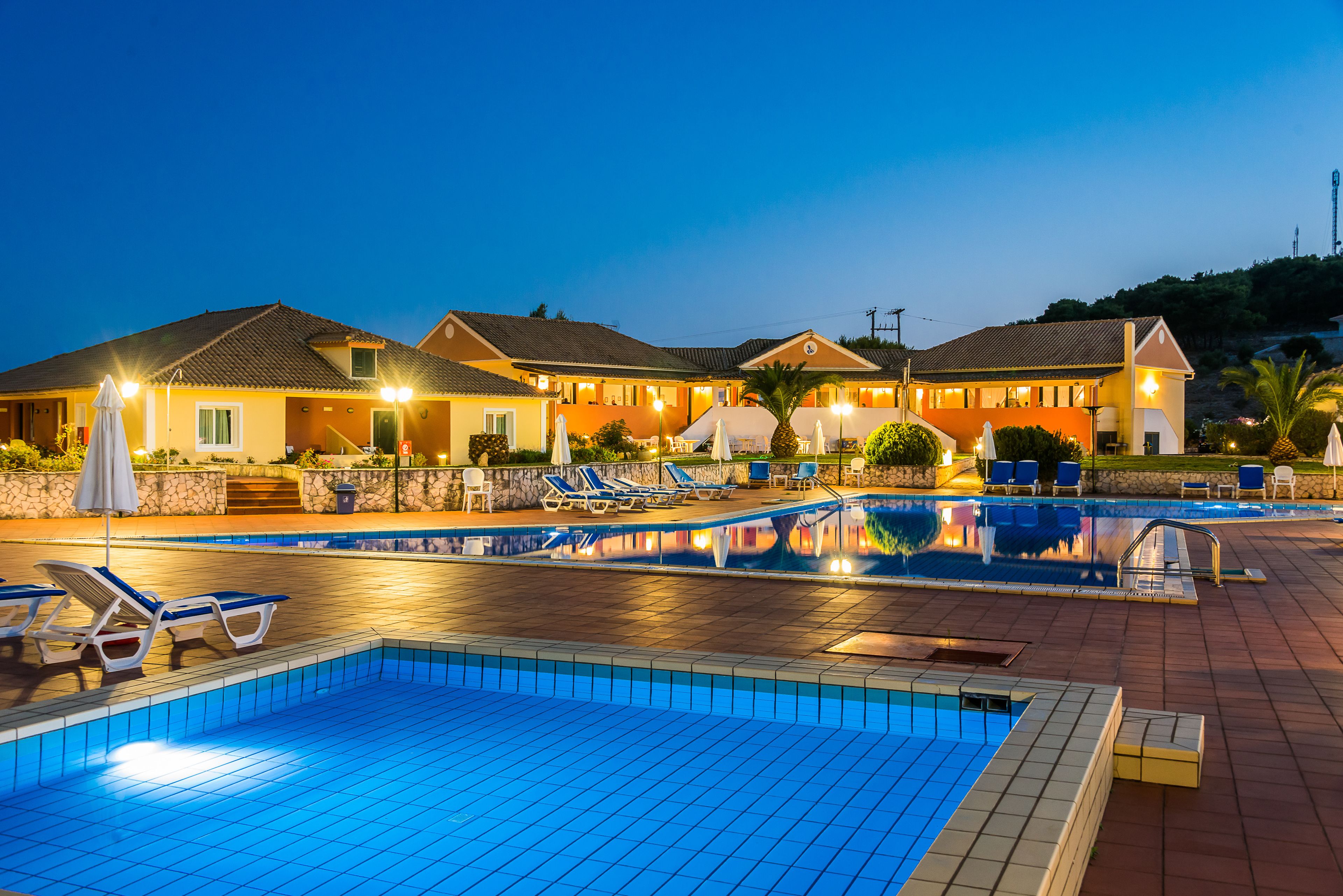 Seasonal outdoor pool, open 7:30 AM to 7:00 PM, free cabanas
